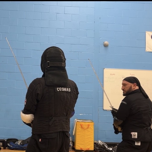 Olgun Tiltay learning Longsword from Cosmas Cieplak-Mayr von Baldegg HEMA instructor in Ausardia